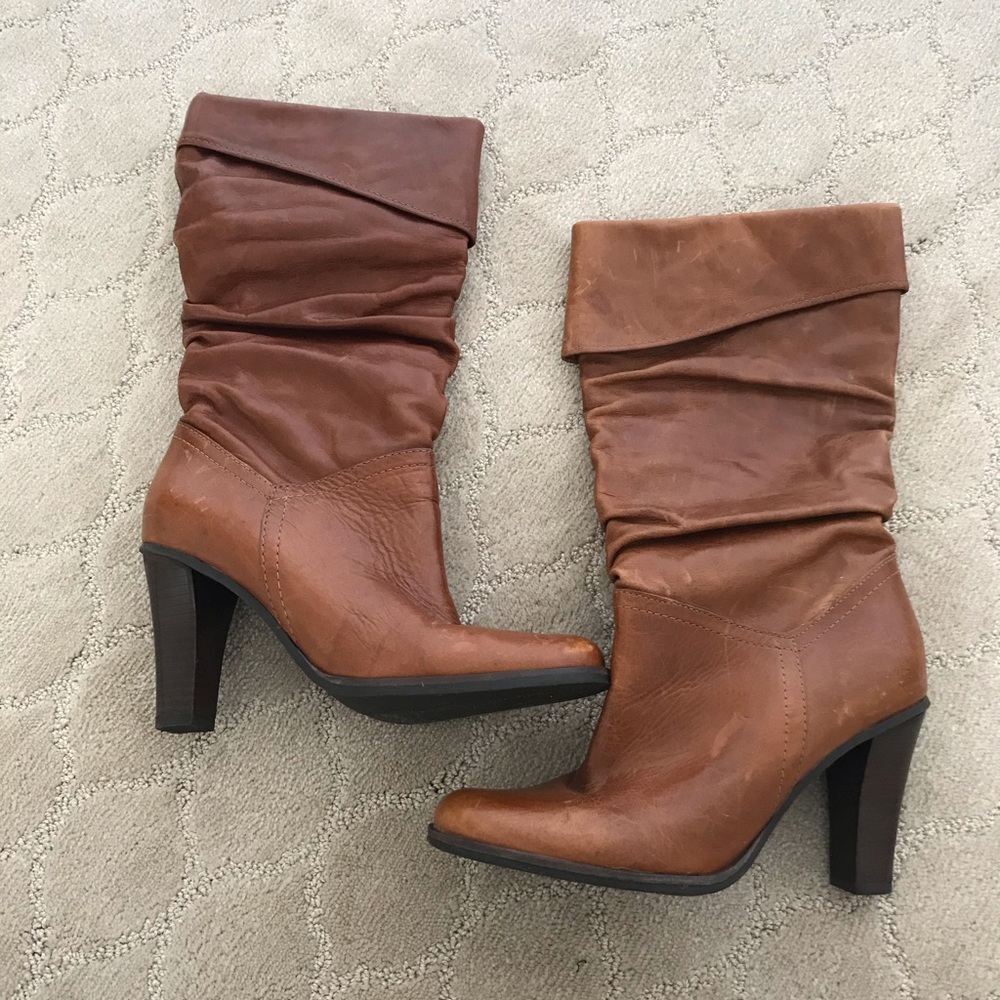 Slouchy brown leather boots.